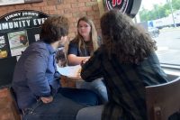 Three friends at a restaurant